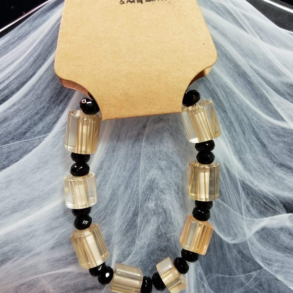 Handmade bracelet w/Black/winter white glass beads
